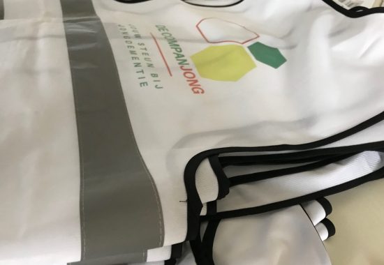 Fluohesje, veiligheidshesje, werkkledij, personaliseren, bedrukt, gepersonaliseerd, logo, naam, Lokeren, Westerlo